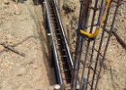 concrete footing reinforcing - concrete is being poured now